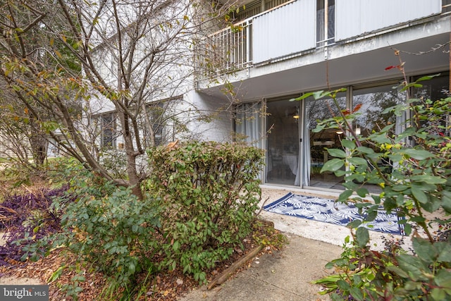 property entrance with a balcony