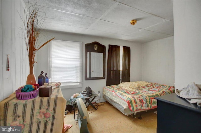 bedroom featuring a drop ceiling