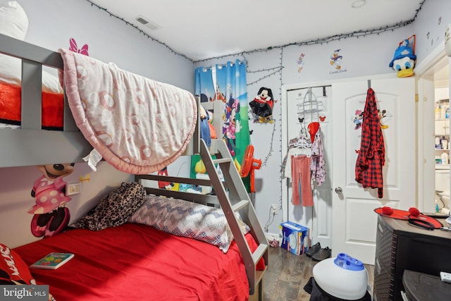 bedroom with wood-type flooring