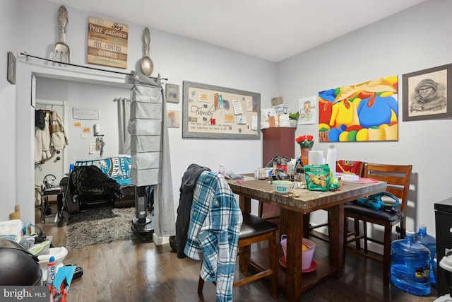 dining room with hardwood / wood-style floors