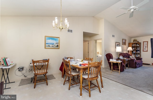 carpeted dining space featuring ceiling fan with notable chandelier and vaulted ceiling