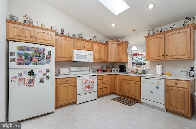 kitchen featuring decorative light fixtures, white appliances, backsplash, and lofted ceiling with skylight