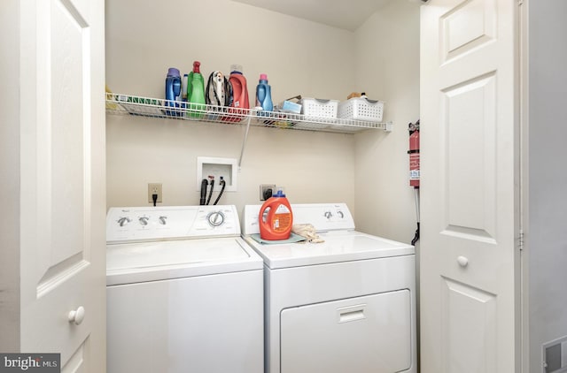 laundry area featuring separate washer and dryer