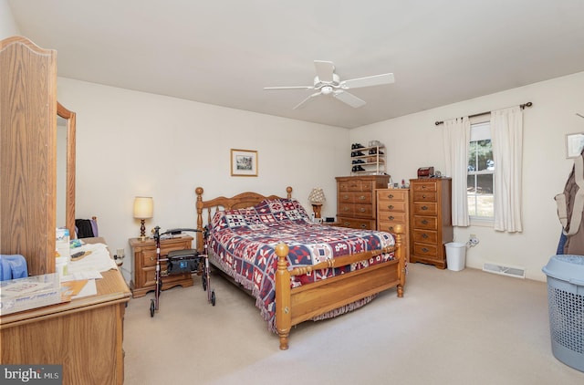 bedroom featuring ceiling fan and light colored carpet