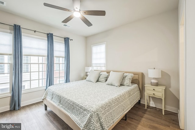 bedroom featuring ceiling fan and hardwood / wood-style flooring