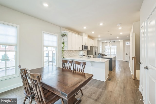 dining area featuring hardwood / wood-style flooring