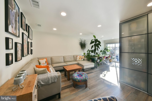 living room with wood-type flooring