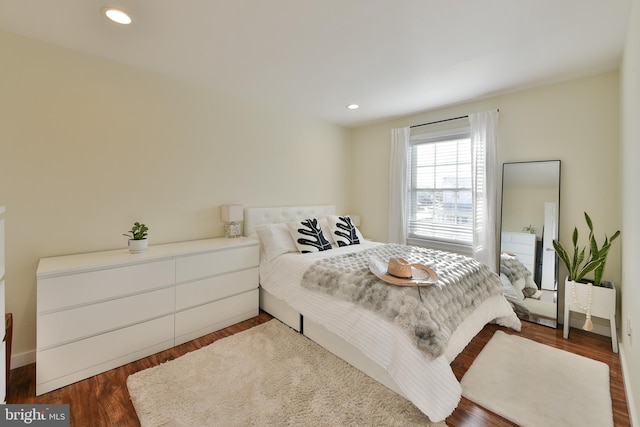 bedroom featuring dark wood-type flooring