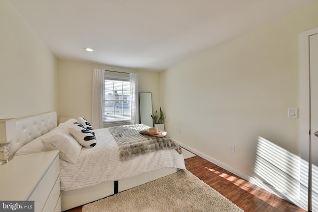 bedroom featuring hardwood / wood-style floors