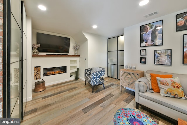 living room featuring light wood-type flooring