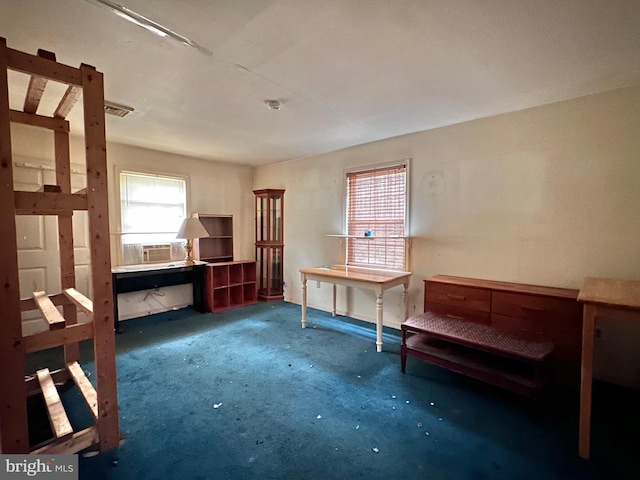 miscellaneous room featuring cooling unit and dark colored carpet