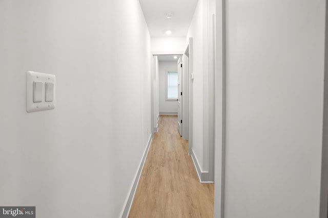 hallway featuring light wood-type flooring