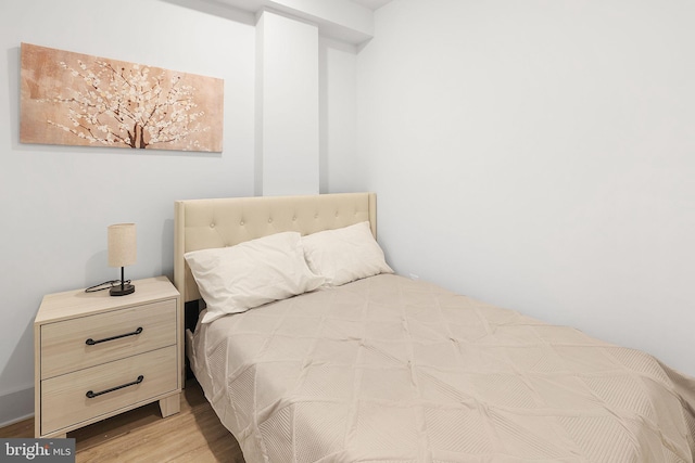 bedroom featuring hardwood / wood-style flooring