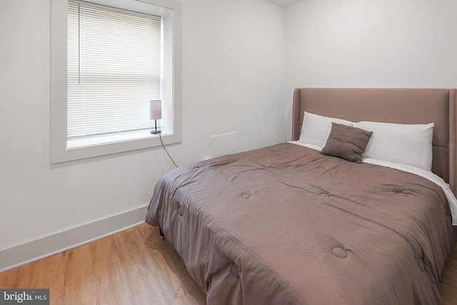 bedroom featuring light hardwood / wood-style floors