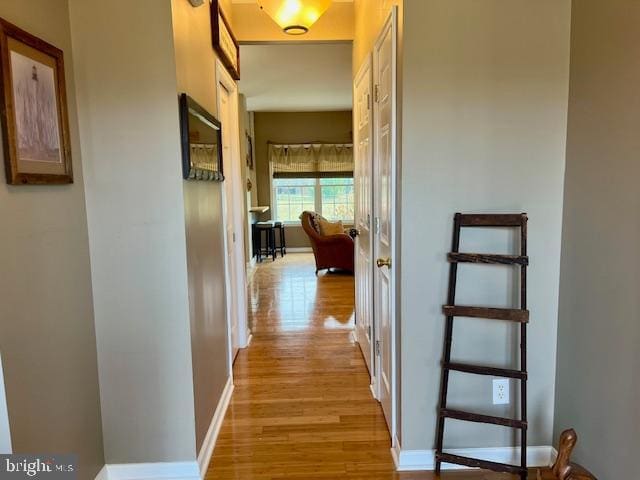 corridor featuring light wood-type flooring