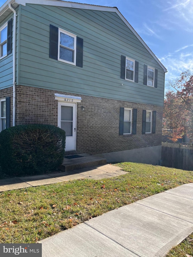 front of property with a front yard