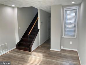 interior space featuring wood-type flooring