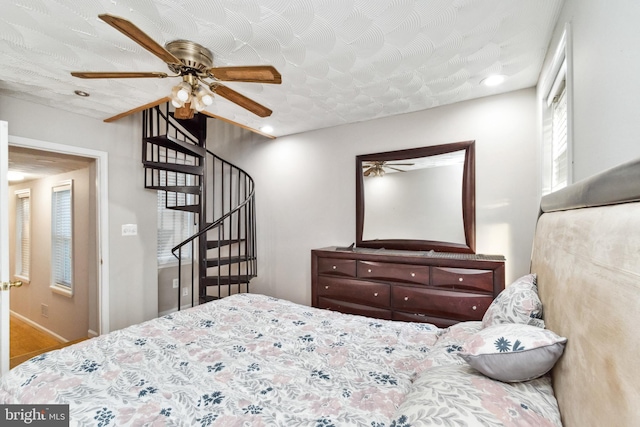 bedroom featuring ceiling fan