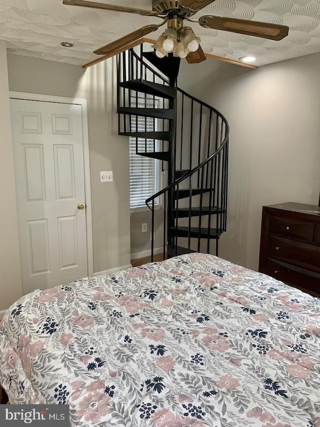 bedroom featuring ceiling fan