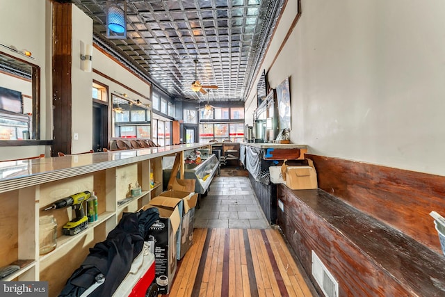 storage area with ceiling fan