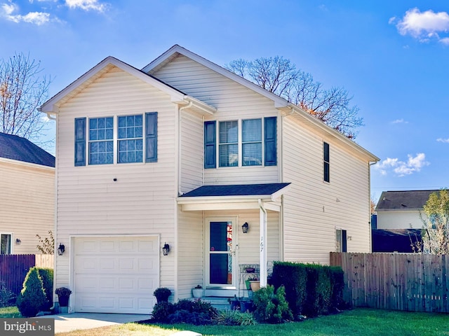 view of front of home with a garage