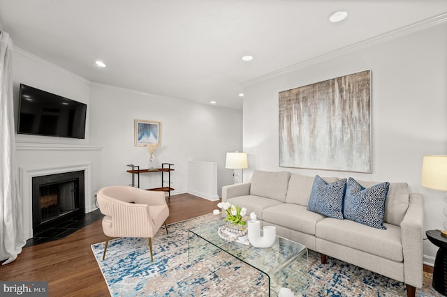 living room with crown molding and dark wood-type flooring