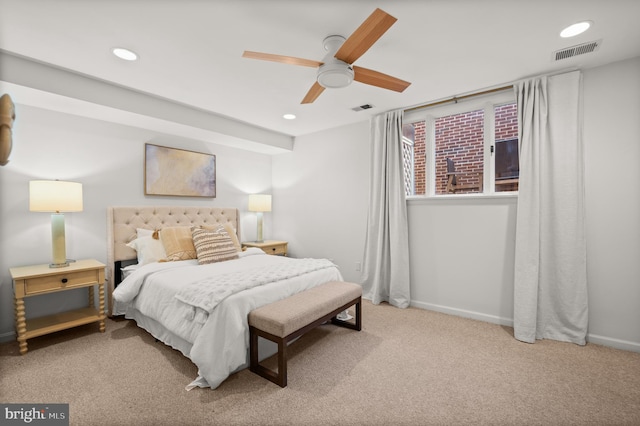 carpeted bedroom featuring ceiling fan