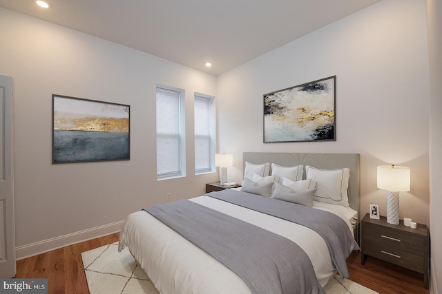 bedroom with light hardwood / wood-style floors