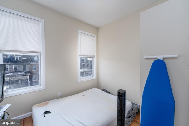 bedroom featuring hardwood / wood-style flooring