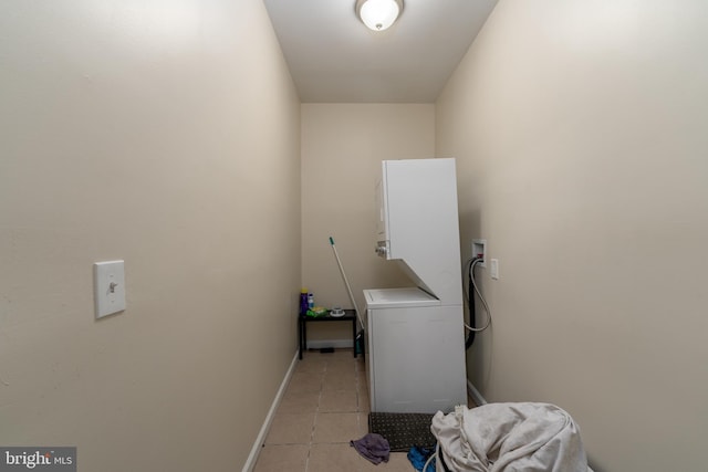 laundry area featuring light tile patterned flooring