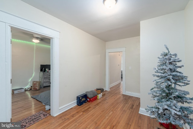 empty room with light hardwood / wood-style flooring