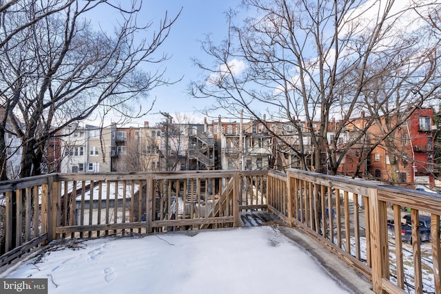 view of snow covered deck