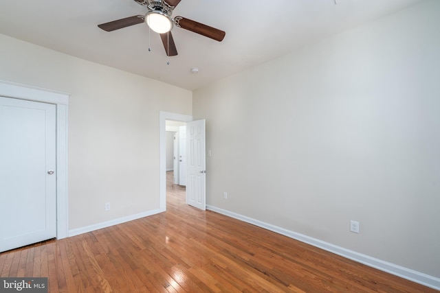 unfurnished bedroom featuring ceiling fan and light wood-type flooring