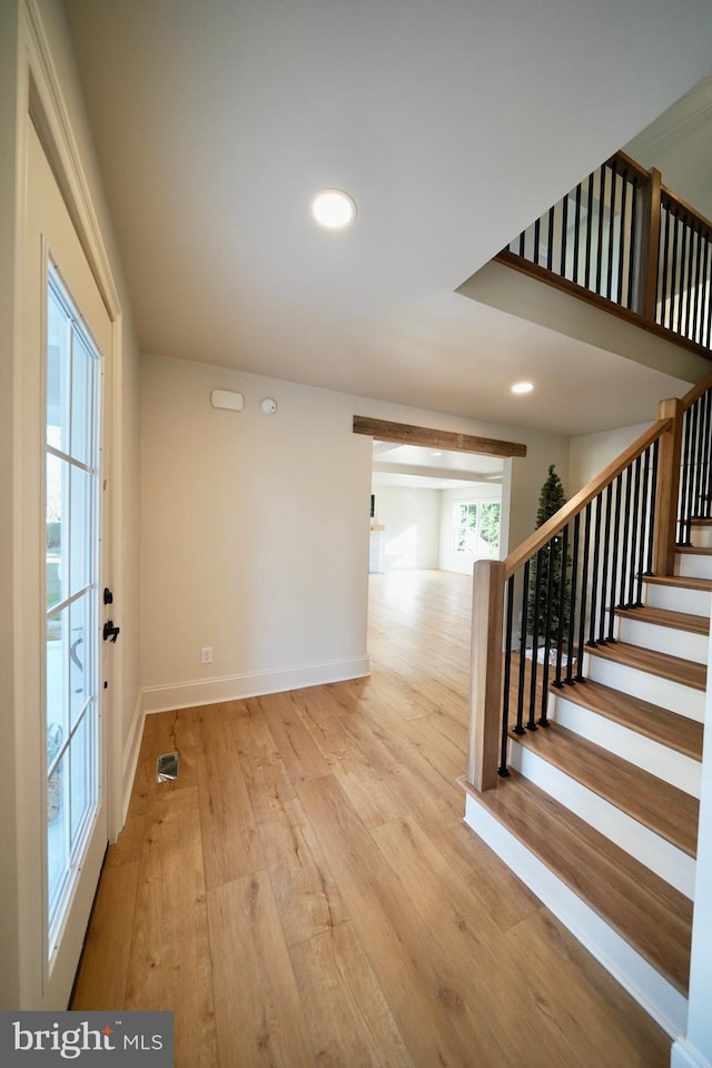 entrance foyer featuring light hardwood / wood-style floors