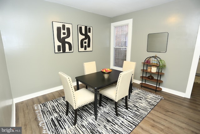 dining room featuring dark hardwood / wood-style floors