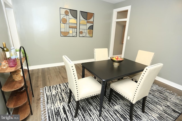 dining room featuring hardwood / wood-style flooring