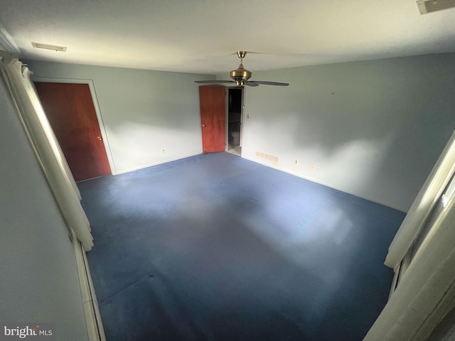 unfurnished room featuring ceiling fan