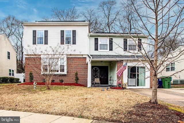 view of front of house with a front lawn