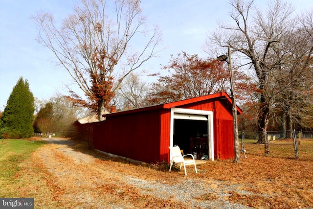 view of outbuilding with a garage