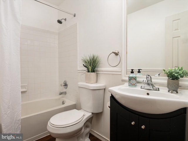 full bathroom featuring hardwood / wood-style floors, vanity, toilet, and shower / bathtub combination with curtain