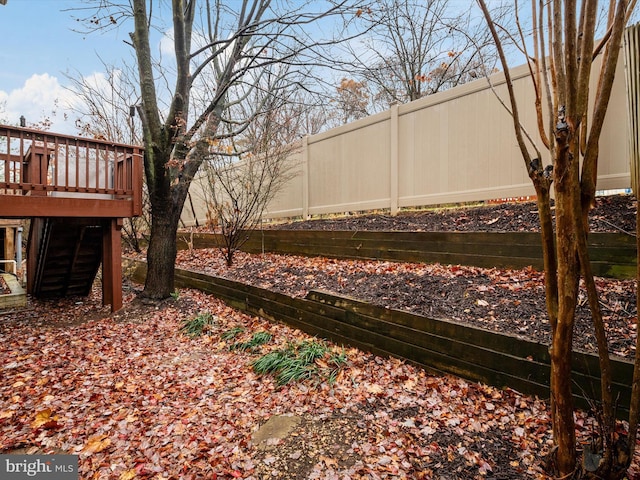 view of yard featuring a deck