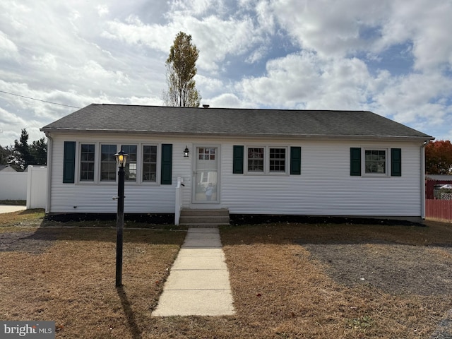 view of front facade with a front lawn