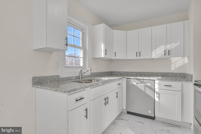 kitchen featuring dishwasher, white cabinetry, light stone countertops, and sink