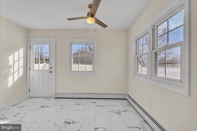 interior space with a baseboard radiator and ceiling fan