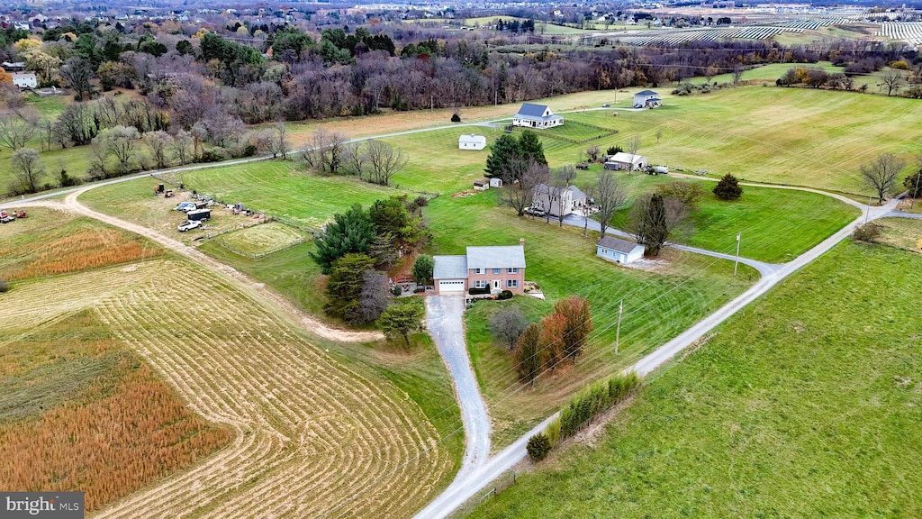 birds eye view of property featuring a rural view