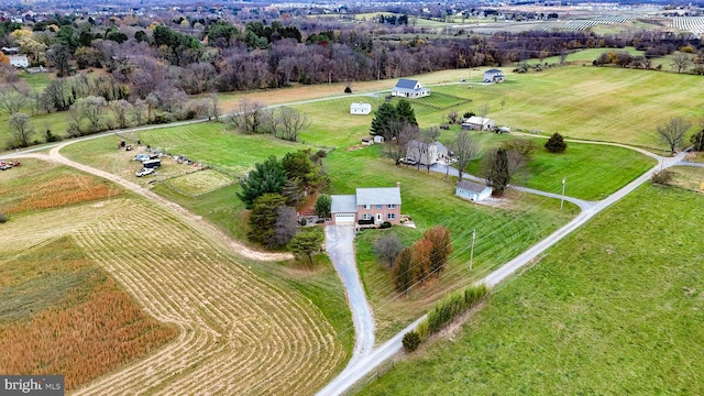 birds eye view of property featuring a rural view