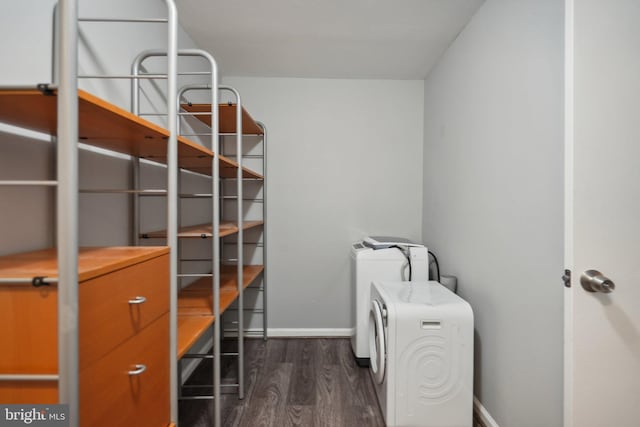 storage room featuring washing machine and dryer