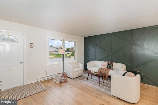 interior space featuring hardwood / wood-style flooring and baseboard heating