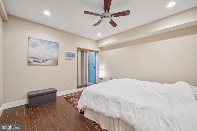 bedroom featuring dark hardwood / wood-style floors and ceiling fan