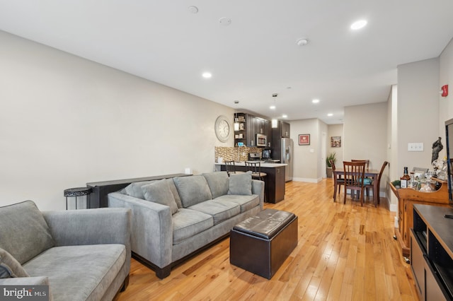 living room with light wood-type flooring